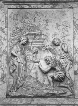 Obrázek kamenného reliéfu v Shugborough Hall, který zobrazuje tři pastýře a ženu před hrobkou.